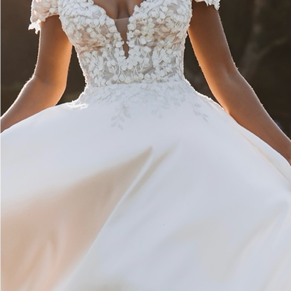 Allure bridal gown 9908. I had the dress cleaned and preserved after wedding.
